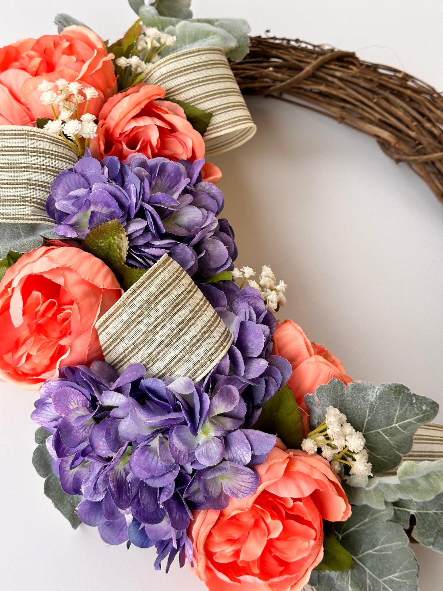 18 in. Vine Wreath with Artificial Orange Peonias and Purple Hydrangea, with Wild Greenery